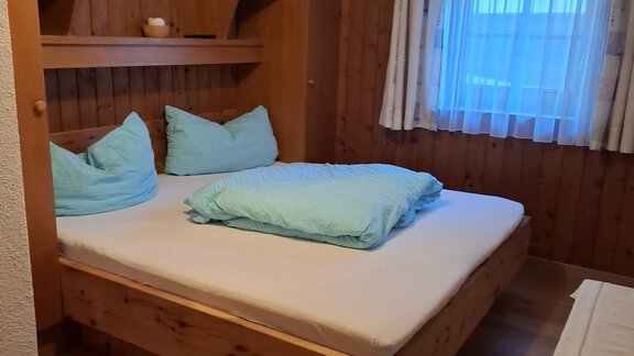 Doppelzimmer mit Zirmbett mit Sitzgelegenheit Leis - Haus Gletscherblick - Gries