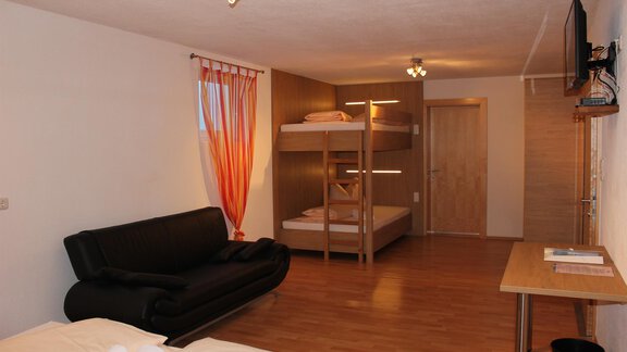 Bett gr. Zimmer - Chalet Mühle - Huben
