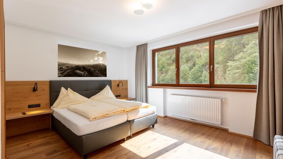 Doppelschlafzimmer - Alpenappartement Central Valley Penthouse - Längenfeld