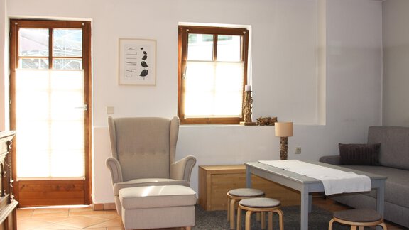 gemütlicher Sitzbereich mit Zugang zum Garten - Apart im Zentrum - Längenfeld