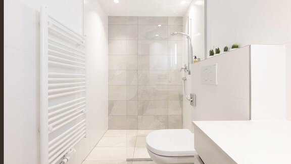 A modern bathroom with bright tiles and a walk-in shower. The space is clean and minimally designed. - Haus Verwall Appartements - Obergurgl 