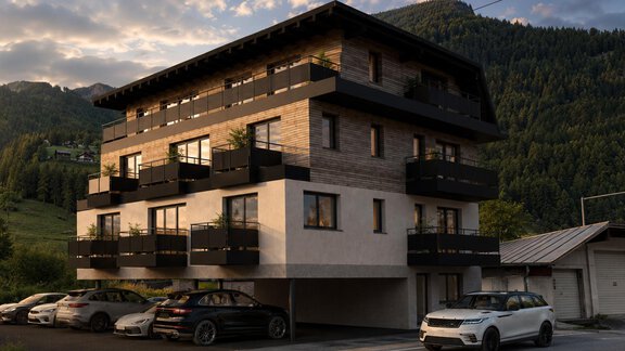 A modern building with several balconies in a picturesque mountain landscape. Several cars are parked in front of the house. - A CASA "Aventurin" - Sölden
