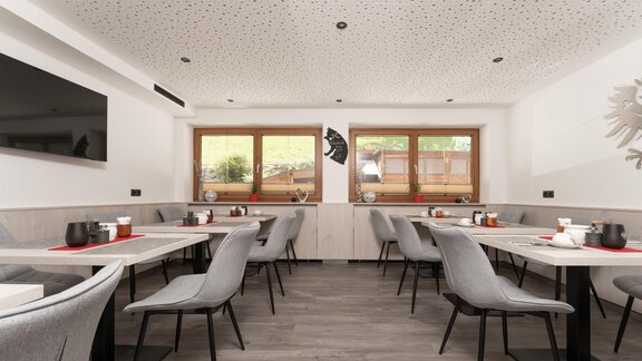 A modern restaurant with elegant tables and chairs. Large windows let in plenty of daylight. - Alpenliebe - Sölden