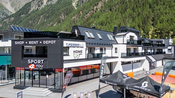A modern sports shop "Sport 4 You" is located on the ground floor of the building, and the newly built apartments are located on the upper floor. - Home4You - Sölden