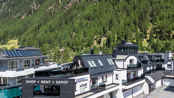 A modern sports store "Sport 4 You" is located on the ground floor of the building, while the newly built apartments are located on the upper floor. - Home4You - Sölden