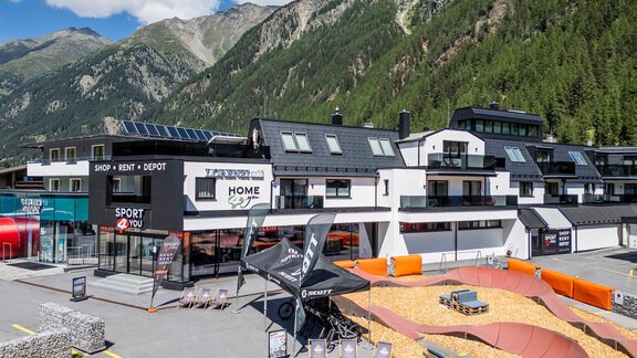 A modern sports store "Sport 4 You" is located on the ground floor of the building, and the newly built apartments are on the upper floor. - Home4You - Sölden