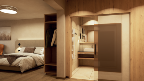 A modern bedroom with a comfortable bed and warm wood tones. In the background, there is an elegant bathroom with a protected washing area. - Hotel Garni Hainbacherhof - Sölden