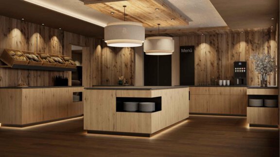 A modern, elegant interior with wood paneling and soft lighting. The wooden counters provide an inviting atmosphere for guests. - Hotel Garni Hainbacherhof - Sölden