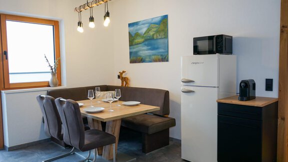 Wohnküche mit gemütlichem Sitzbereich - Appartement Emilia - Umhausen