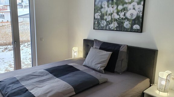 FW Murmele, Schlafzimmer, Boxspring-Doppelbett - Ferienwohnung - Murmele - Umhausen
