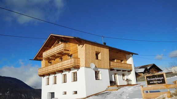 Hausansicht Winter - Ferienwohnungen Hausegg - Haiming
