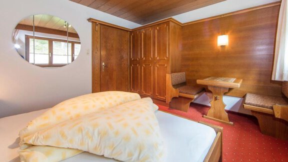 Schlafzimmer - Apart Alpen - Huben