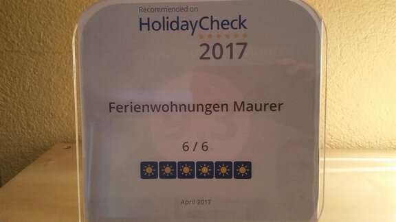 Auszeichnung HolidayCheck - Ferienwohnungen Maurer - Umhausen
