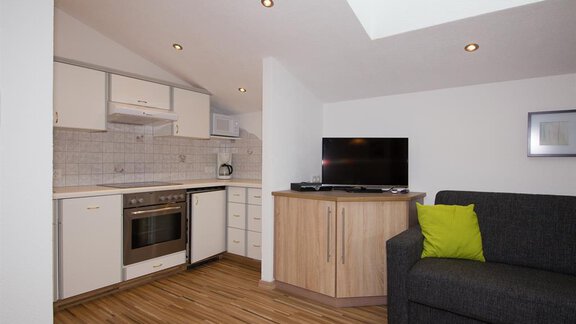 Wohnbereich mit Küche Appt A - Appart Fiegl Alois - Huben