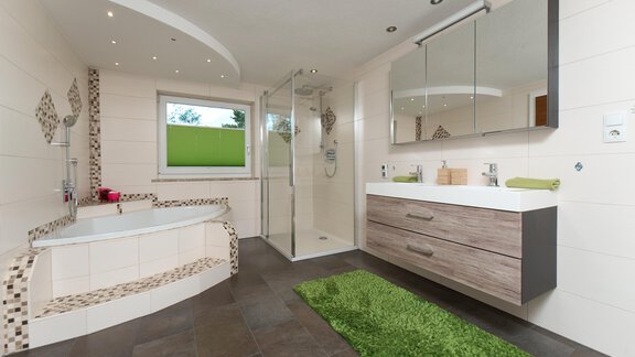 Badezimmer mit Badewanne und Dusche - MYHOME-Ambach - Haiming
