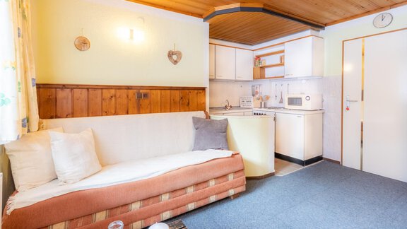 Wohnzimmer mit Kochnische - Haus Suban - Huben