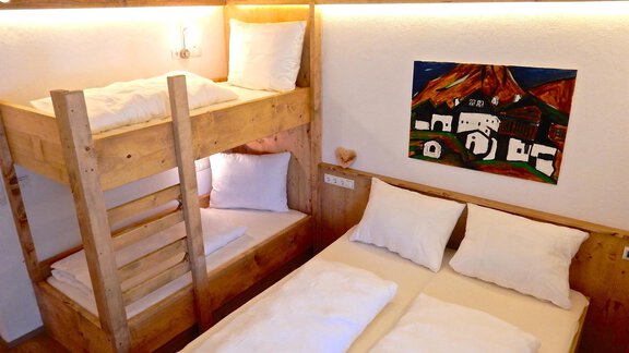 Schlafzimmer Deluxe - Ferienhaus Alpina - Sautens
