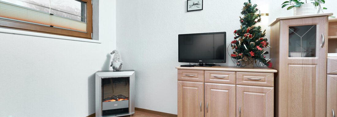 Wohnzimmer mit TV - Ferienwohnungen Winnebach - Gries