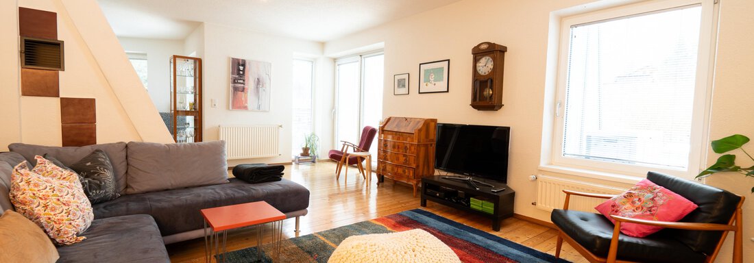 großzügiger Wohnbereich mit Kamin - Haus Neu-Ambach - Haiming