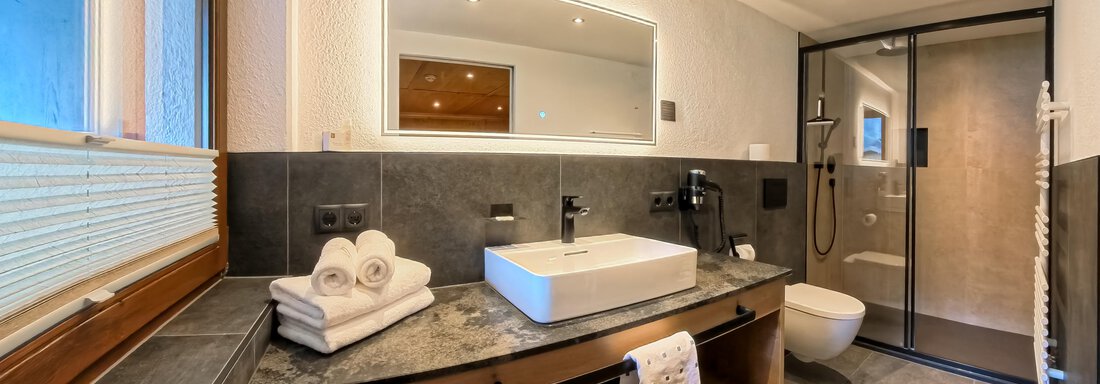 Badezimmer Appartement 1 - Appartements Alpenrose - Huben