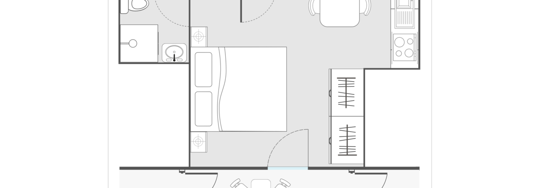 Das Bild zeigt einen Grundriss eines Studios mit einem Schlafzimmer, einem Wohnzimmer und einer Küchenzeile. Es sind auch Badezimmer und Essbereiche eingezeichnet. - Appartements Alpenrose - Huben