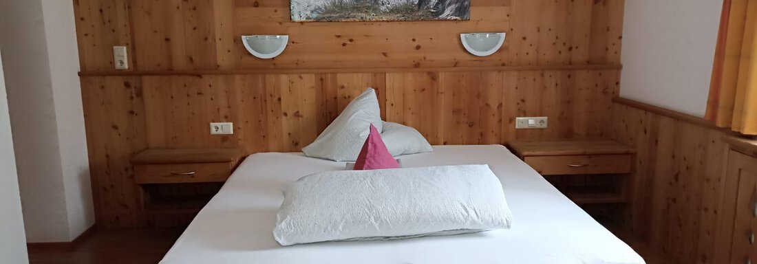 Schlafzimmer Appartement 4 - Daheim Appartements - Huben