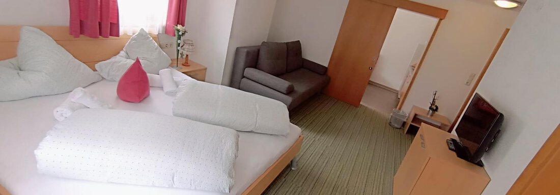 Schlafzimmer Appartement 4 - Daheim Appartements - Huben