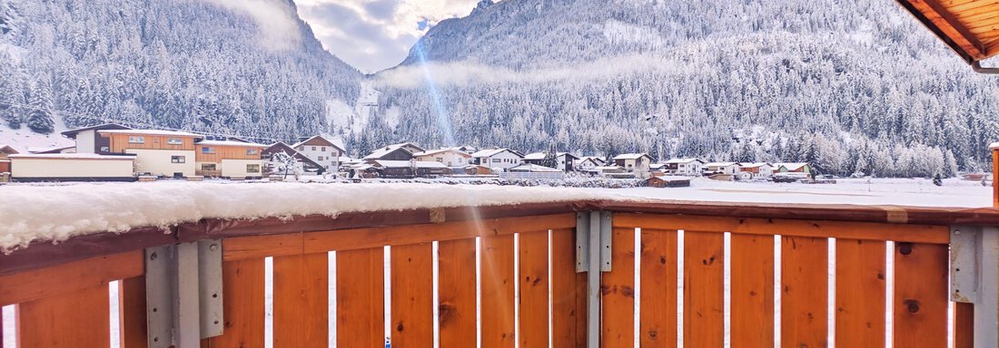 Ferienwohnung Nr. 1 Balkonaussicht Winter - Ferienwohnungen Stabentheiner - Huben