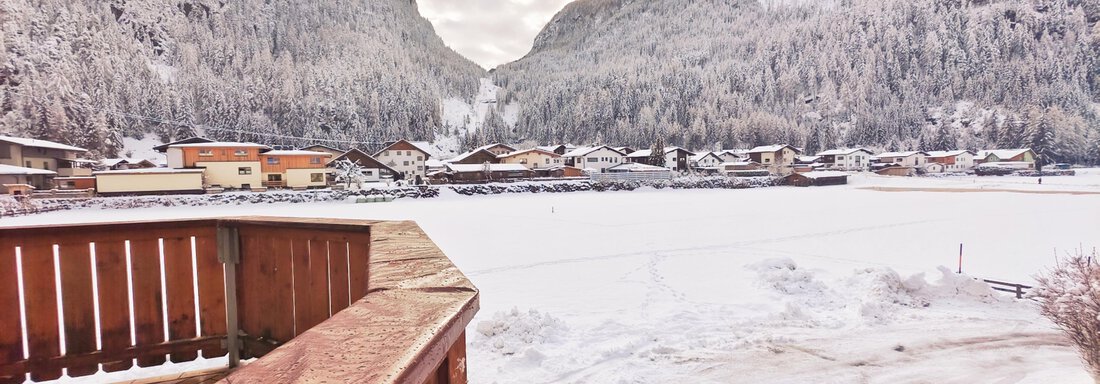 Ferienwohnung Nr. 2 Balkonaussicht Winter - Ferienwohnungen Stabentheiner - Huben