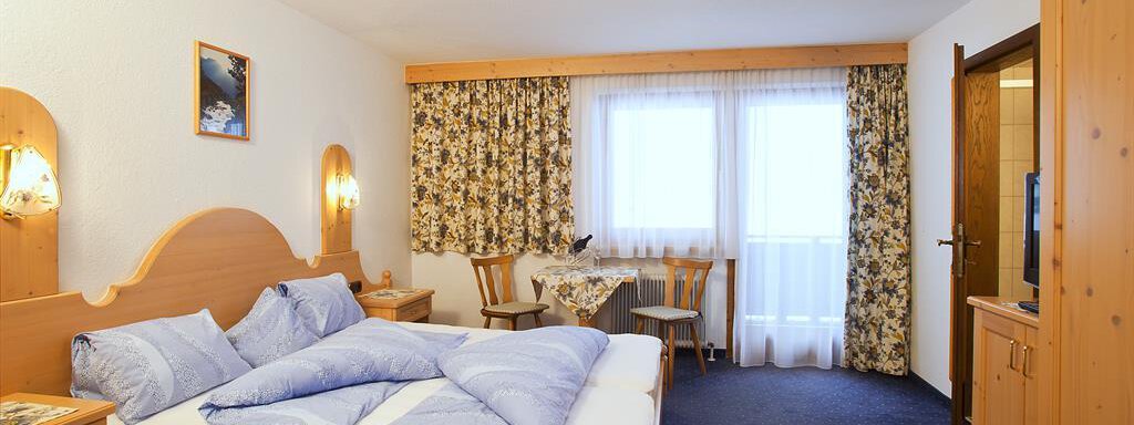 Schlafzimmer Schlafzimmer - Gästehaus Helga - Huben
