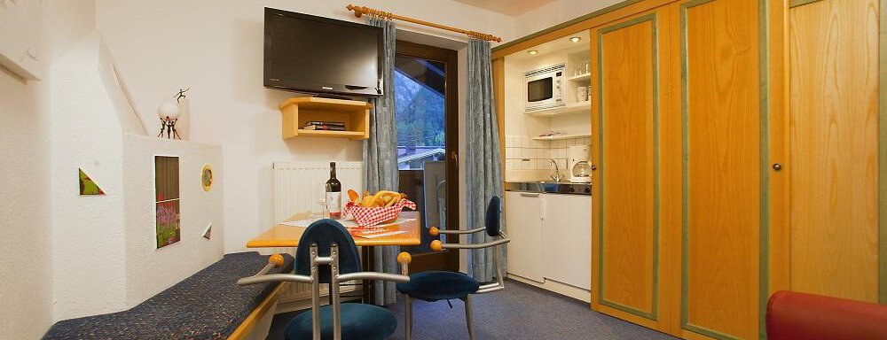Wohnzimmer - TOP TIROL - das appartement - Huben