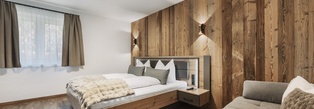 Doppelzimmer 2 mit Schlafsofa - Alpenglühn Apart Längenfeld - Längenfeld