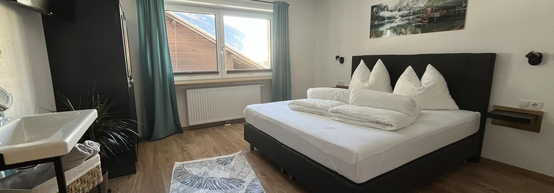 Zimmer mit Doppelboxspringbett - Apart Aurelia - Längenfeld