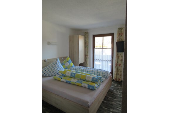 Doppelbett - Appartements Grüner - Längenfeld