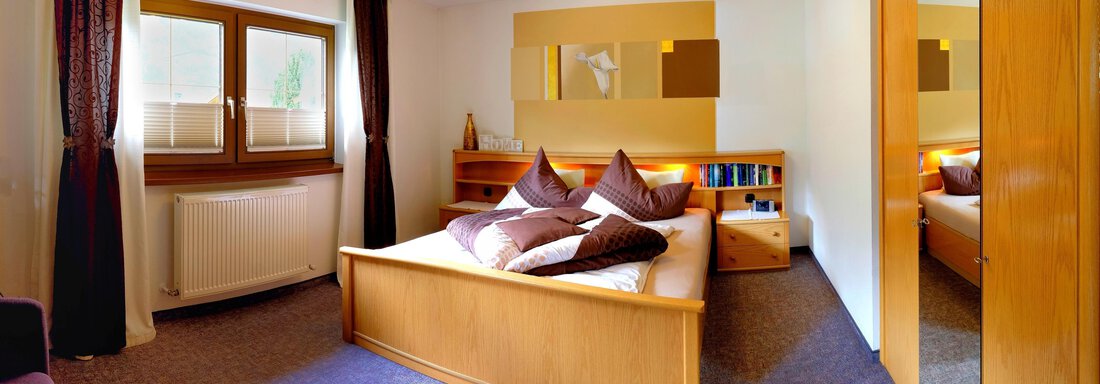 AY Schlafzimmer - Appartements Kuprian - Längenfeld