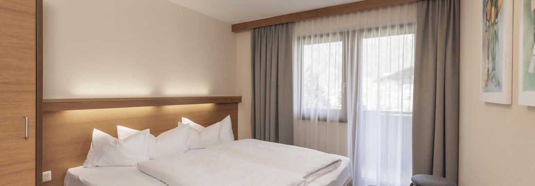 Schlafzimmer_Typ A - Appartements Panorama - Längenfeld