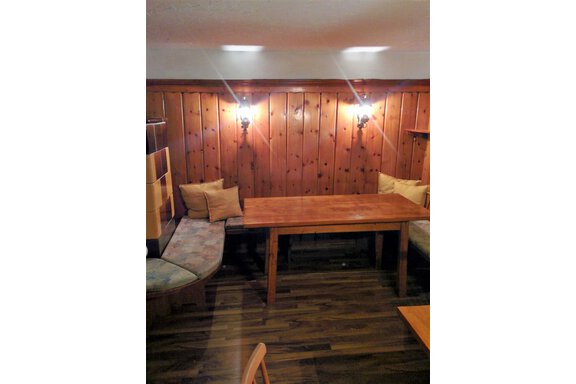 Tiroler Stube mit Kachelofen Tiroler Stube mit Kachelofen - Ferienhaus Berger - Längenfeld
