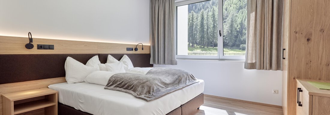 Apartment Molly Schlafzimmer | © Christoph Nösig Photography (CC C) Apartment Molly Schlafzimmer - Hannesn Hof FamilyApart - Längenfeld