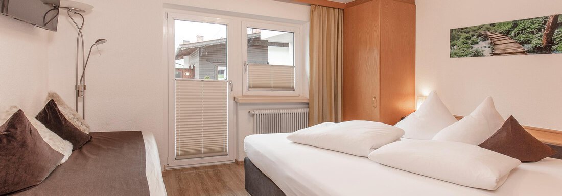 Appartement "A" Schlafzimmer - Haus Sonnenheim - Längenfeld