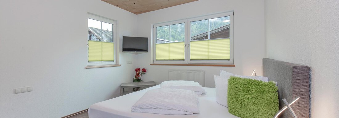 Appartement "B" Schlafzimmer Grün - Haus Sonnenheim - Längenfeld