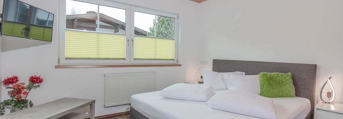 Appartement "B" Schlafzimmer Grün - Haus Sonnenheim - Längenfeld