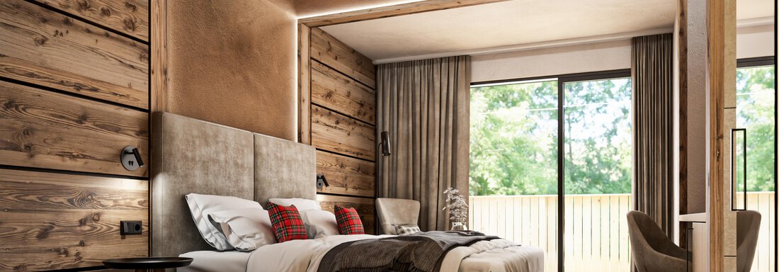A modern bedroom with wooden walls and a large window. The bed is decorated with cozy pillows, and there are furniture pieces in warm colors. - Hotel Tauferberg - Niederthai