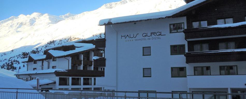 A modern building in the snow with the inscription "Haus Gurgl". In the background, snow-covered mountains can be seen. - Haus Christophorus - Obergurgl 