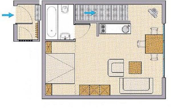 A floor plan representation of an apartment with a living area, a kitchen, a dining area, and a bathroom. The layout shows an open, functional space with furniture. - Ferienwohnungen Broser - Obergurgl 