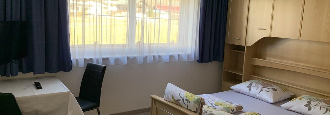 Schlafzimmer im Erdgeschoß - Apartment Erhart - Oetz
