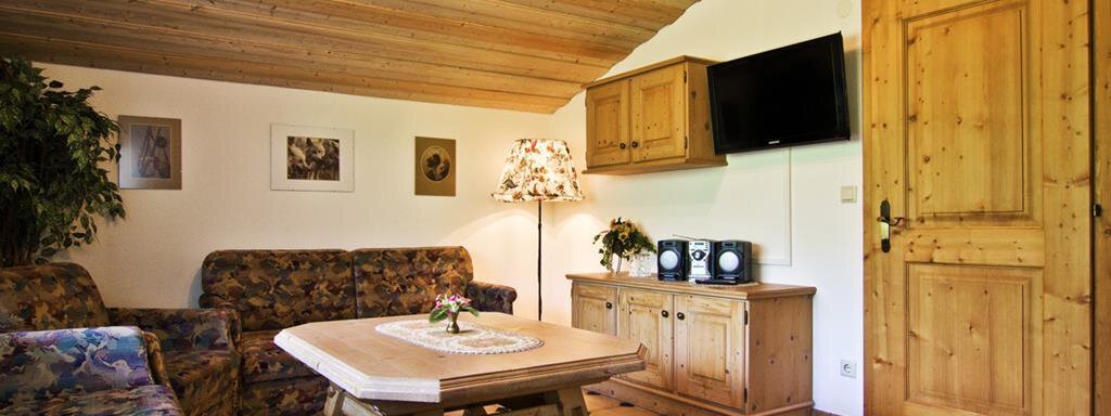 Wohnzimmer | © JI Wohnzimmer - Apparthotel Riina - Sautens