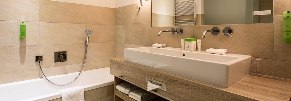 Badezimmer Kreuzjochspitze - Hotel Ritzlerhof - Sautens