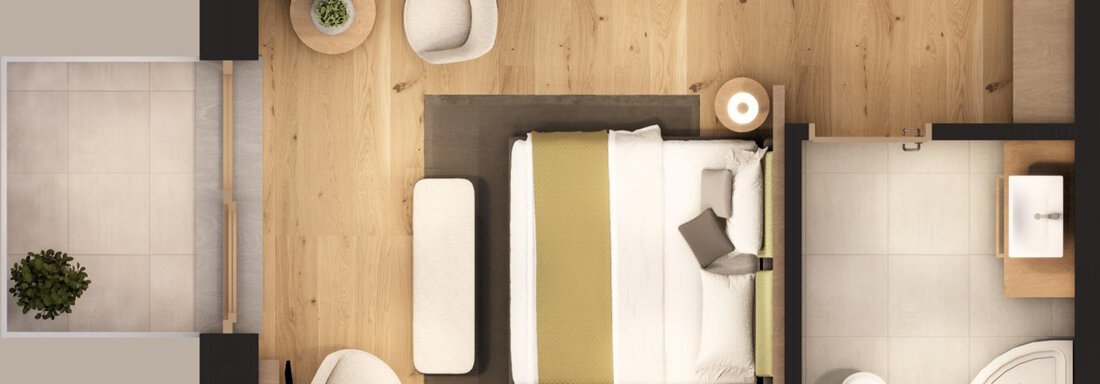 A modern bedroom with a large bed, a seating area, and a bathroom. The room has a bright wooden floor and a minimalist decor. - A CASA "Aventurin" - Sölden