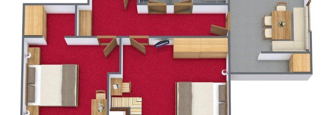 A floor plan drawing for an apartment with two bedrooms, a living room, and a kitchen. The rooms are depicted in a clear layout, with red carpets and wooden-colored furniture. - Apart Wiesengrund - Sölden