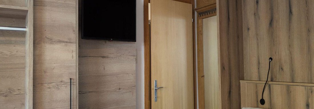 Wohnlandschaft als vollwertiges Doppelbett und TV - Appt. Rosmarie - Sölden